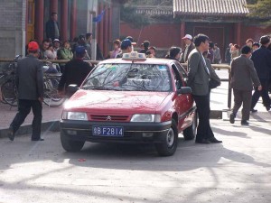 Example of unlicensed, black taxis in Beijing