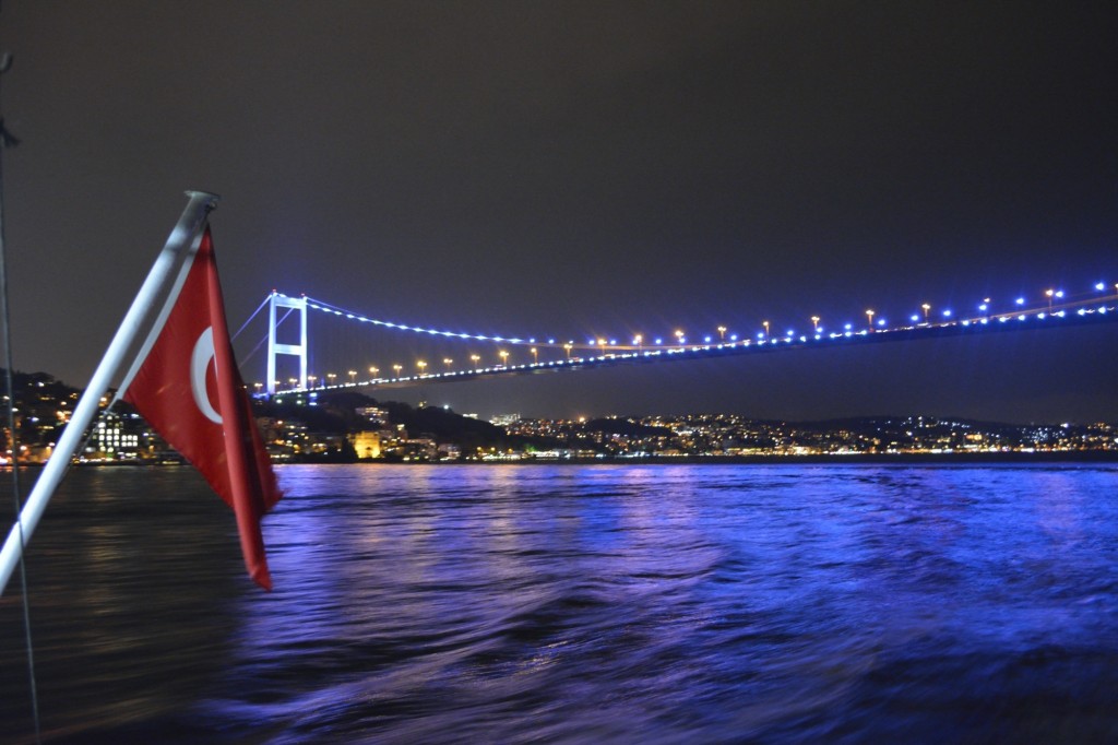 Night Cruise Under Bosphorus Bridge connecting Asia and Europe