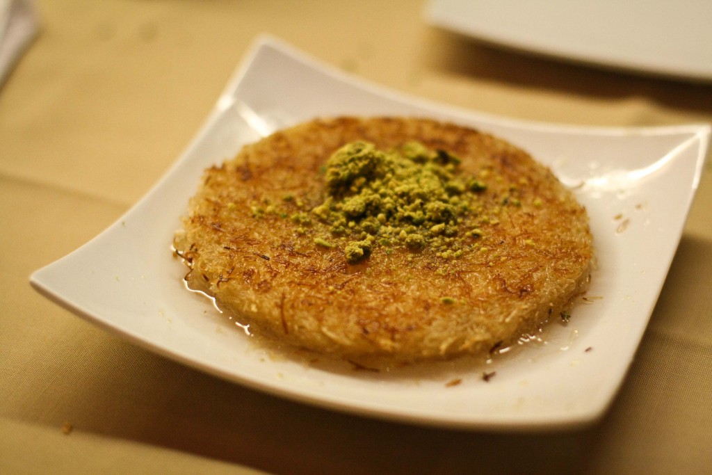 Kunefe, cheese pastry soaked in sweet sugar-based syrup