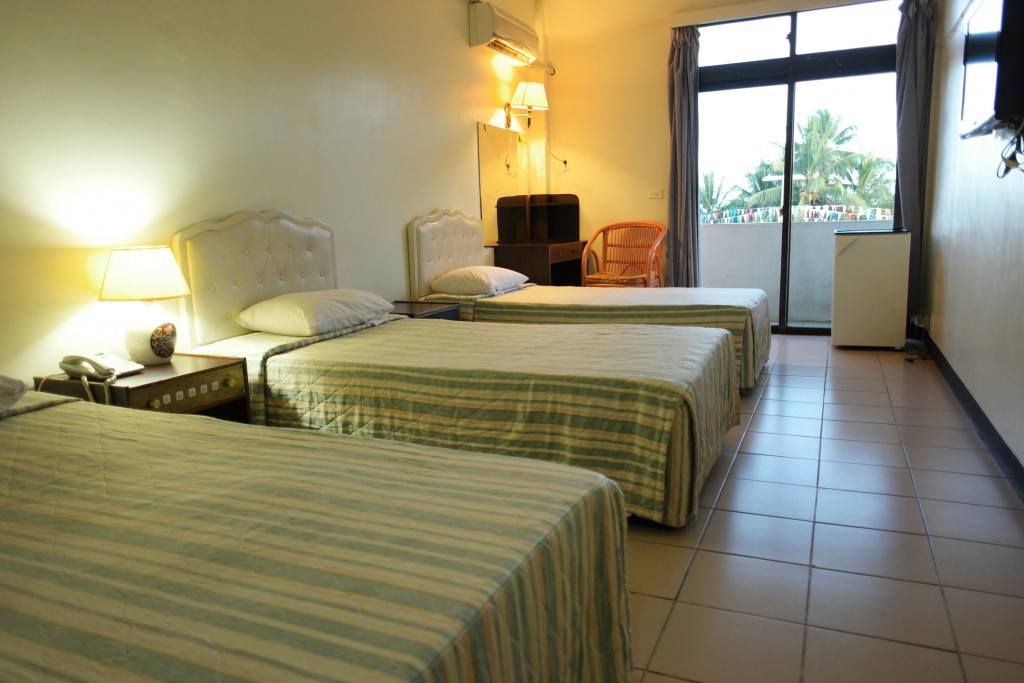 One of the triple rooms, equipped with satellite channels, fridge, air condition, balcony, private bathroom, liens and towels.
