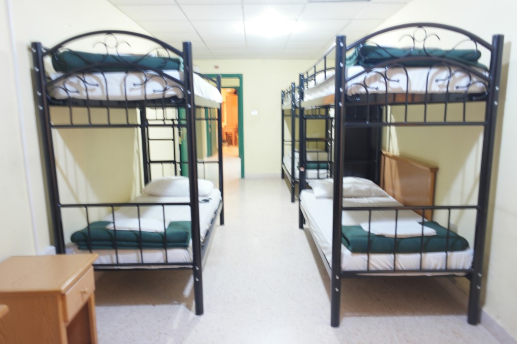 Dorm Beds with large lockers, in-suite shared bathrooms