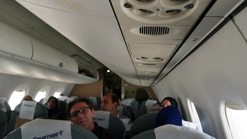 Egyptair logo is all over the interior of the aircraft
