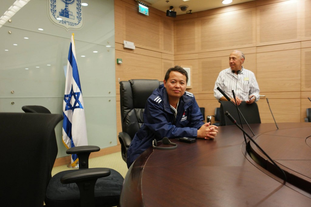 Charles Huang inside the Committee Room of the Knesset 